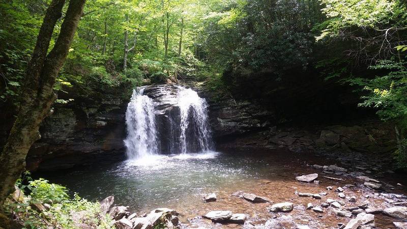 A 30ft water fall that has a swimming hole under it.