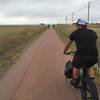 Rolling over the red limestone of the Cowboy Trail.