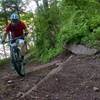 Riding up the steps on Red Trail.