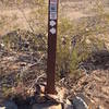 Sign at the beginning of the trail. Best route is to head right. Most riders take it counter-clockwise.