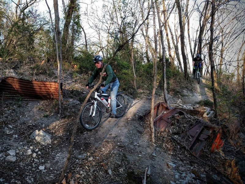 Riders dodge industrial debris on the Mountain Goats Trail at Lehigh Portland Trails.