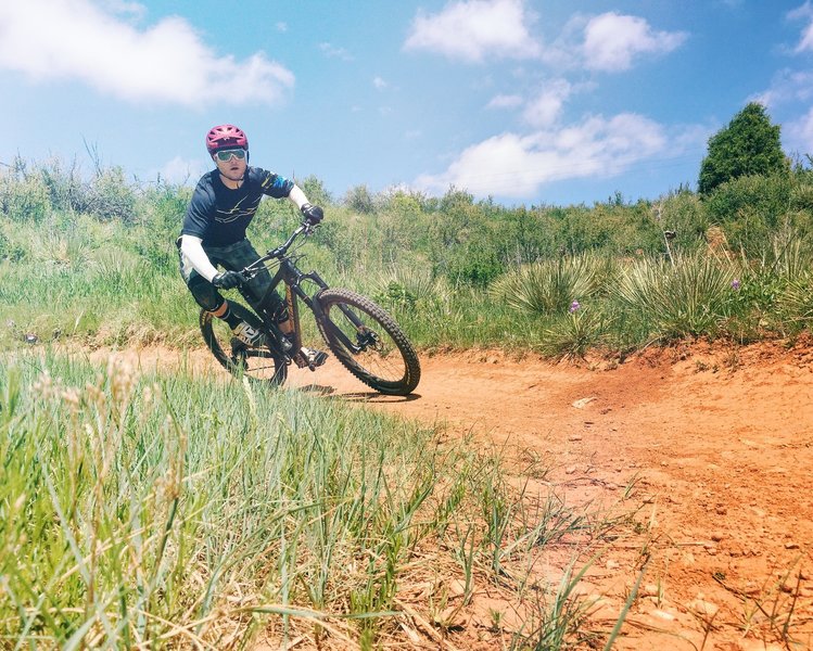 Enjoying the tight corners on Red Rocks Trail on the descent back towards the Mathew Winters parking lot.