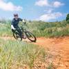 Enjoying the tight corners on Red Rocks Trail on the descent back towards the Mathew Winters parking lot.