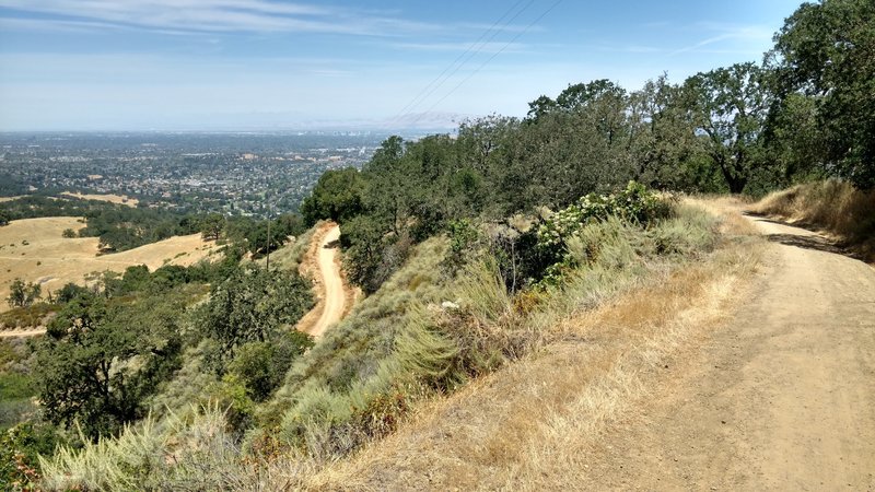 Mine Hill Road's long descent to the lower elevation.