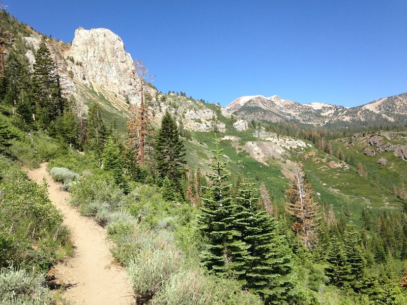 Towering Mammoth Rock with Mammoth Mountain Ski Resort in the back on the right.