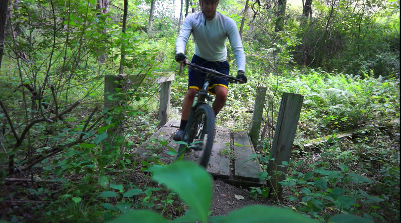 Over an old bridge at the end of White Trail.