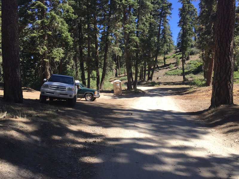 There are several trailhead parking areas along the 2n10 fire road, which runs close to the trail.