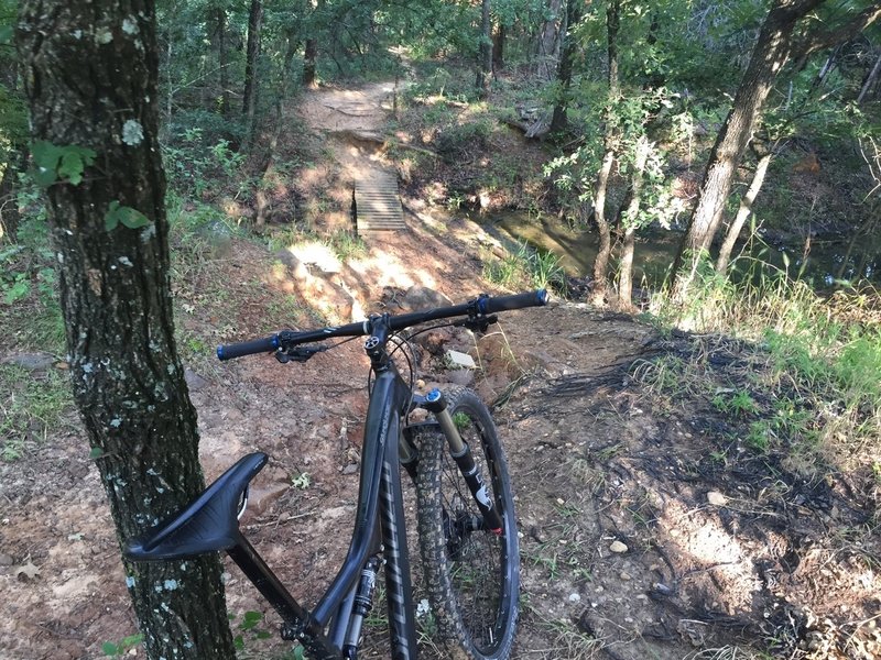 Dropping into a creek crossing at Boulder Park