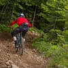 A racer follows the path of least resistance among the baby heads on 2 Chair (160) during the Cascadia Dirt Cup.