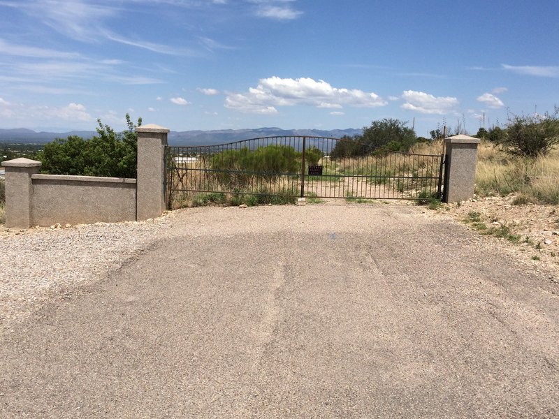 Pedestrian entrance behind the right pillar.