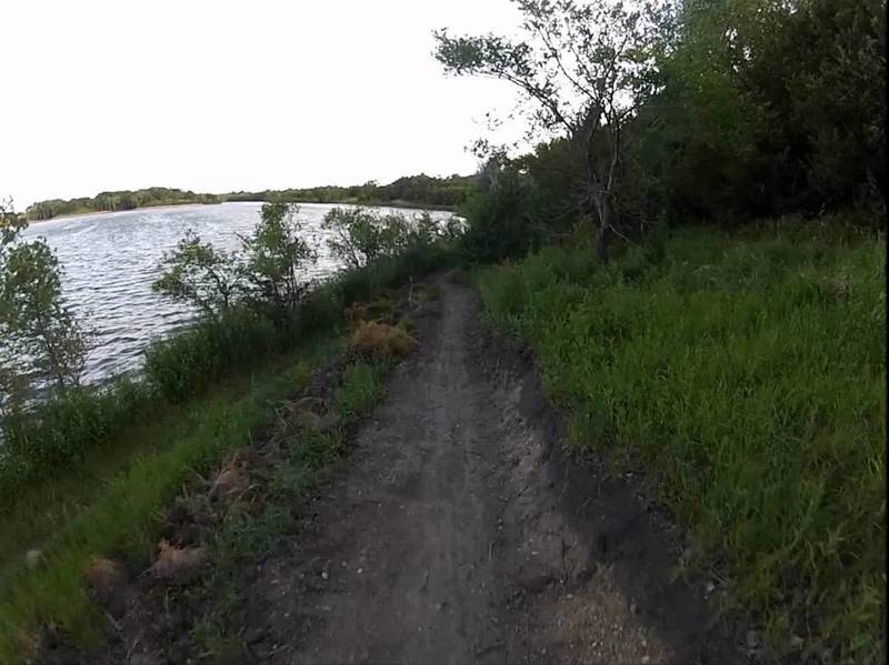 Riding next to the lake.