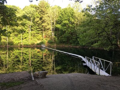 Floating pontoon bridge on Stryker Lake.