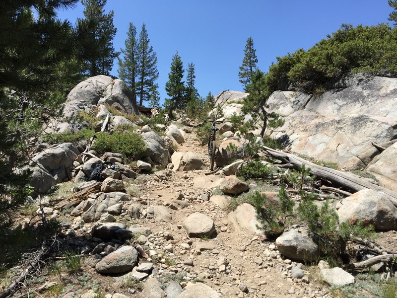 Nasty little hike-a-bike rock garden heading toward the dam on Lake Alpine. The view of the lake here makes it all worth it.