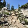 Nasty little hike-a-bike rock garden heading toward the dam on Lake Alpine. The view of the lake here makes it all worth it.