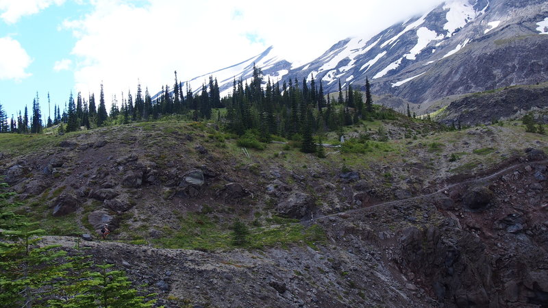 Out of the trees and heading to the mountain.  Almost to the hike-a-bike section.