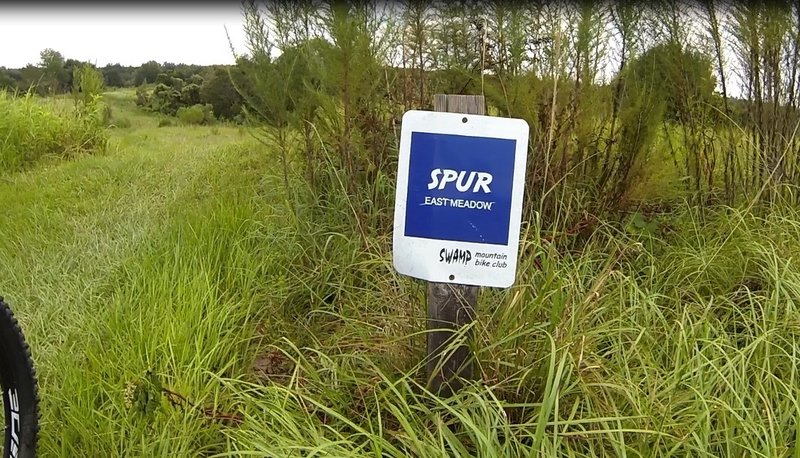 Spur Trail Sign at top of the run... Small Jump just moments away!