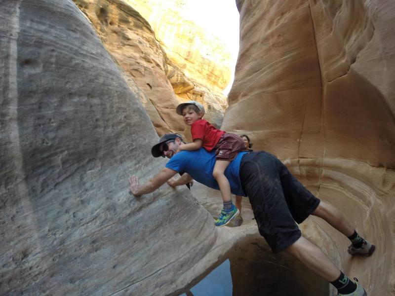 Exploring a little slot canyon just off the White Rim during our lunch stop on day two of our three-day itinerary.