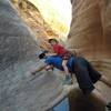 Exploring a little slot canyon just off the White Rim during our lunch stop on day two of our three-day itinerary.