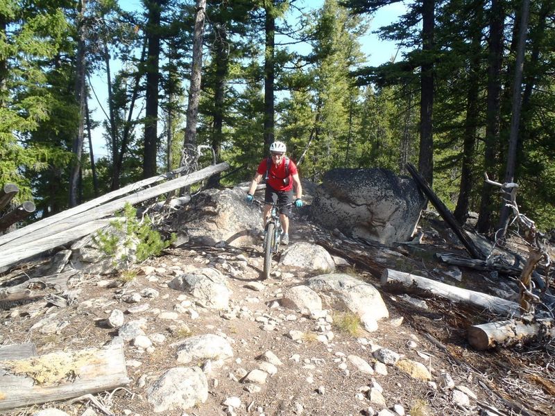 Riding through rock outcrops on the eastern ridge.