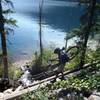 "Walking the plank" across a stream at the head of the lake.