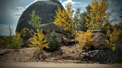 Large boulders and aspen groves line Mount Herman Road.