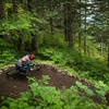 Tight turns through the lush forest along the Cold Creek Trail.