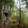 Karen O'Connell powers up a short punchy rise on the Lower Ridge Trail.