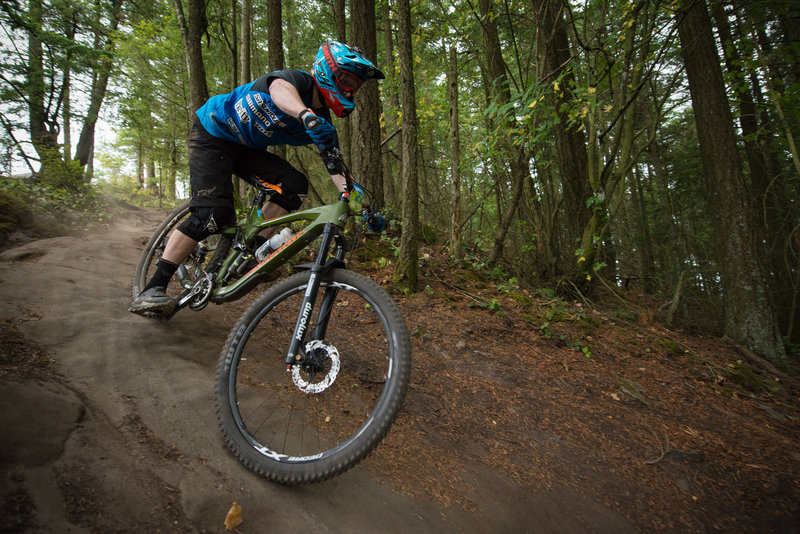 Kyle Warner skids across a sandstone slab while racing the Lower Ridge Trail.