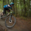 Kyle Warner skids across a sandstone slab while racing the Lower Ridge Trail.