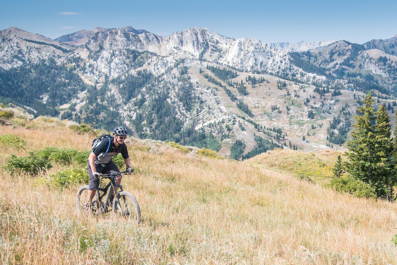 Beginning one of the many descents on the Wasatch Crest Trail with Solitude Ski Area in the background.