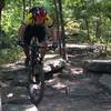 Downhill rock garden with a hairpin at the bottom.