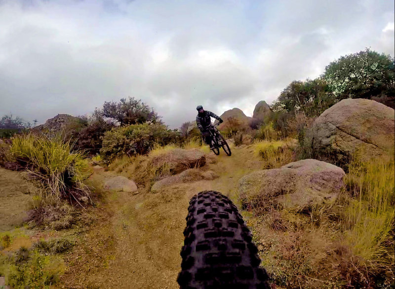 The descent from the water tanks takes you through huge boulders on each side so watch your pedals.