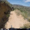 Putting some of the natural trail features to good use, on the lower section of the trail.