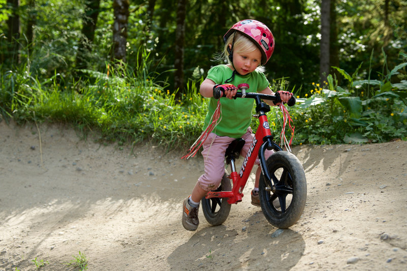 Learning on the pump track at Duthie Hill Park, WA.