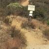 At the 1.2-mile point, the left side of gate on trail as depicted.