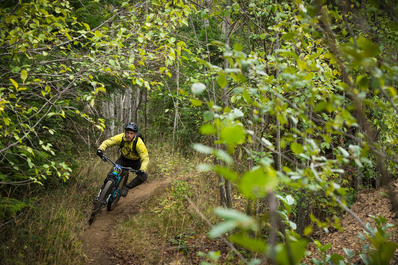 Sam Larson heads for the road jump at the end of Upper Scott's Mom.