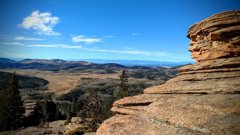 Views stretch toward Cripple Creek all the way to the Sangre de Cristo range 100 miles away.