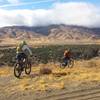 Riding the Highland trail in extremely windy conditions! In the photo, looking north, towards the San Gabriel Mountains.