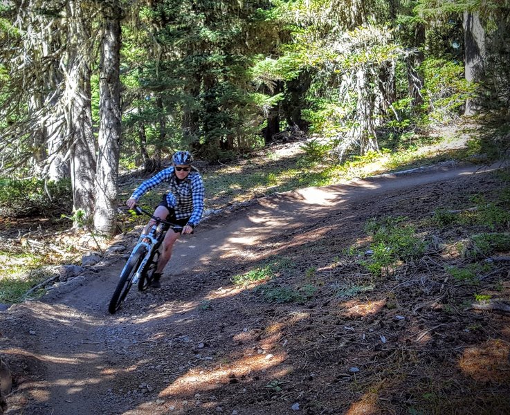 Carving up one of the many nicely banked berms.