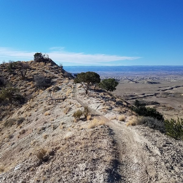 Fun ridgeline riding before you fall off one of the steep descents.