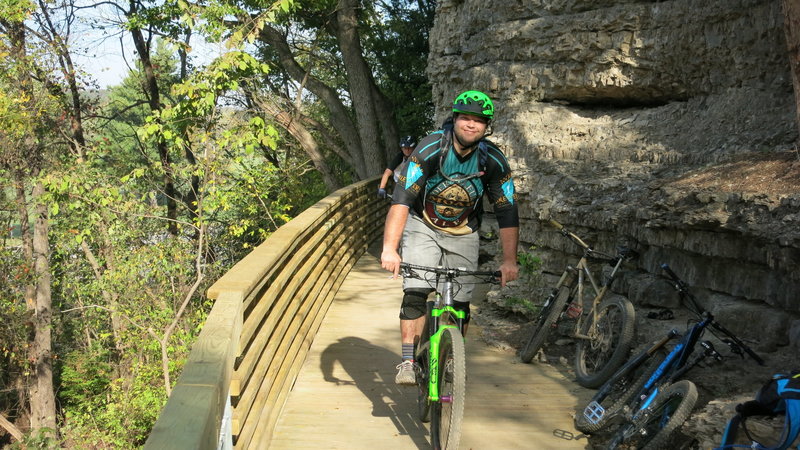 Riding the "Bluff Bridge" along the trail near Hwy 71.  A great feat of trail engineering!