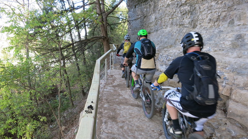 RIders on the "Bluff Bridge" near Hwy 71.  Notice the extensive rock work.