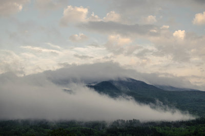 Cloaked in clouds.