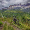 Sweet singletrack on the way to the Passo Pordoi with the Sella Mountain Group in the background.