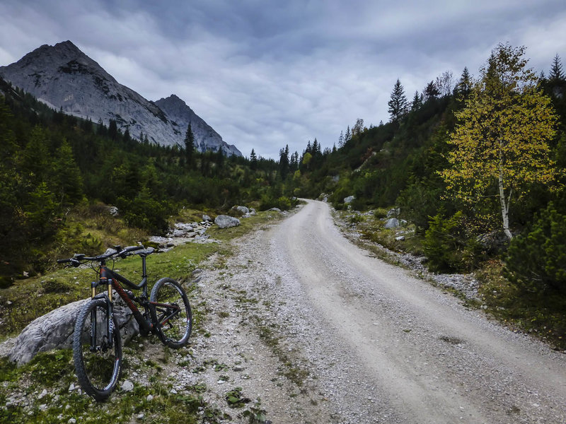 Stopping for a moment to enjoy the views and the solitude on the 17-mile descent along the Gaistalbach stream.