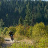 Riding the rocky and rough Five Corners Road at Silver Mountain Bike Park.