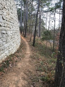 The Chesley Creek Loop traveling beside the retaining wall for the Blue Ridge School athletic fields.