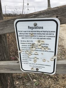 This is the second sign I've seen shot up...the other looked like 5.56 and was about a mile West of here.  Not cool...