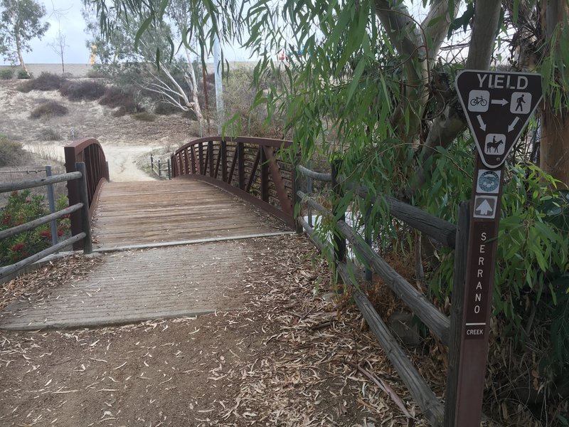 Serrano Creek Trail criss-crosses the creek at several points.