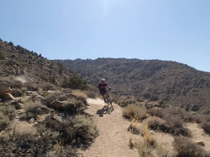 Drifting through some sandy switchbacks on the Coyote Flat Trail heading back to Bishop